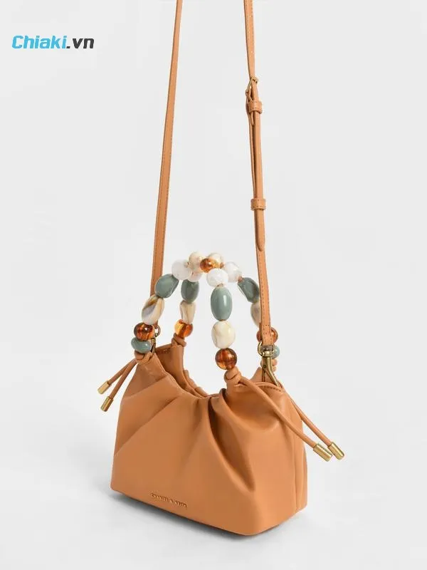 T&uacute;i x&aacute;ch nữ Charles & Keith Aviary Beaded Acrylic Handle Slouchy Bag CK2-10270879 Pumpkin