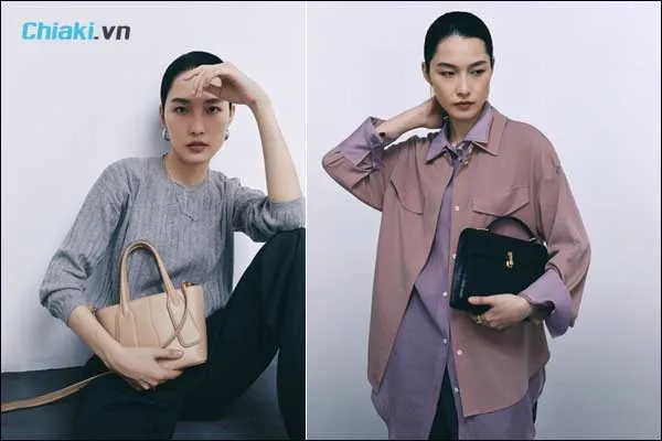 tạo d&aacute;ng chụp ảnh với t&uacute;i x&aacute;ch khi &ocirc;m v&agrave;o người