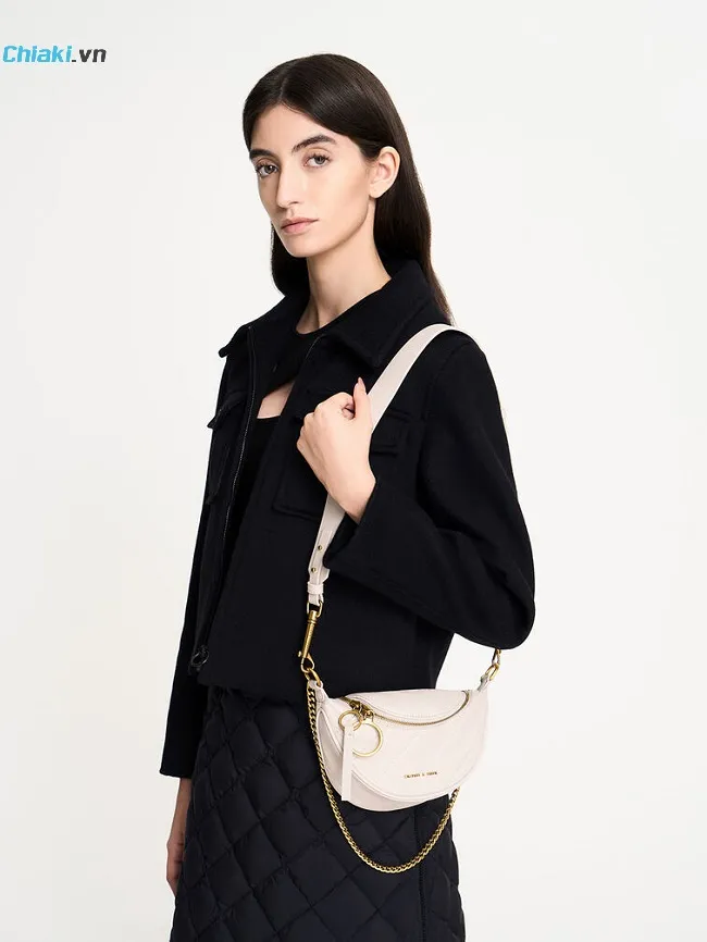 T&uacute;i Charles & Keith Philomena Wrinkled-Effect Half-Moon Crossbody Bag - Ivory