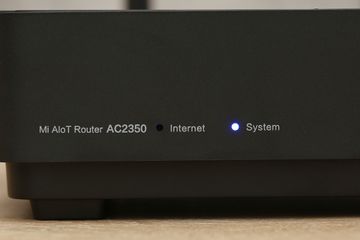 Bộ phát Wifi Xiaomi Mi AIoT AC2350 - 7 ăng-ten ngoài, tốc độ 2183Mbps, kết nối ổn định cho 128 thiết bị, băng tần kép 2.4GHz và 5GHz.
