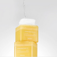 Toner Pad Mediheal Vitamide Brightening - Hỗ trợ làm sáng da, cấp ẩm, cải thiện vết thâm, hộp 100 miếng, phù hợp cho da nhạy cảm.