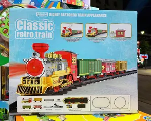 Đồ chơi tàu hỏa đường ray chạy bằng pin 699-73 có 4 toa có đèn và nhạc