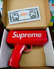 Đồ chơi giải trí súng bắn tiền Supreme The Cash Cannon gun chạy bằng pin