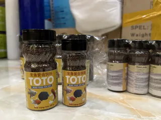 Thức Ăn Cá Cảnh TOTO - Cám Dinh Dưỡng Độ Đạm Cao Cho Guppy, Betta, và Các Loại Cá Thủy Sản Khác - Bổ Sung Protein và Khoáng Chất