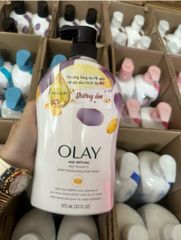 Sữa Tắm Olay Vitamin E 975ml - Dưỡng ẩm và làm sạch cho mọi loại da, hương thơm nhẹ nhàng, chăm sóc da hàng ngày