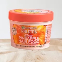 Kem ủ tóc đa năng mùi dứa Garnier Fructis Glossy Pineapple Hair Food 390ml