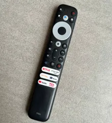 Điều Khiển Remote Tivi TCL Giọng Nói 3 Nút Trắng Dài Smart TV - Phiếm Bấm êm, Tặng Kèm Pin - Phụ Kiện Tivi Chính Hãng