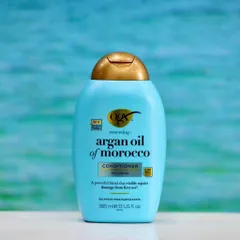 Dầu xả OGX Argan Oil of Morocco 385ml - Nuôi dưỡng, làm mềm tóc hư tổn, phục hồi độ bóng tự nhiên cho tóc khỏe mạnh