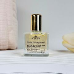 Dầu khô đa năng Nuxe Huile Prodigieuse 10ml - Dưỡng ẩm và làm mềm da tóc, phù hợp cho du lịch, với hương thơm quyến rũ từ thiên nhiên.