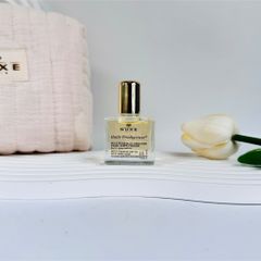 Dầu khô đa năng Nuxe Huile Prodigieuse 10ml - Dưỡng ẩm và làm mềm da tóc, phù hợp cho du lịch, với hương thơm quyến rũ từ thiên nhiên.