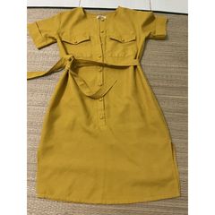 đầm vàng cột dây