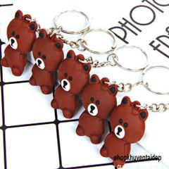 Móc Khóa Gấu Nâu Buồn Ngồi Mặc Áo Sọc - Phụ Kiện Thời Trang Dễ Thương, Quà Tặng Độc Đáo Cho Fan Gấu Brown