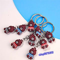 Móc Khóa Gấu Nâu Buồn Ngồi Mặc Áo Sọc - Phụ Kiện Thời Trang Dễ Thương, Quà Tặng Độc Đáo Cho Fan Gấu Brown