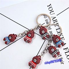 Móc Khóa Gấu Nâu Buồn Ngồi Mặc Áo Sọc - Phụ Kiện Thời Trang Dễ Thương, Quà Tặng Độc Đáo Cho Fan Gấu Brown