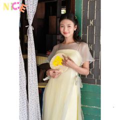 Áo Dài Hai Dây Tết 2026 Kết Hợp Áo Khoác Tơ Giấy - Thời Trang Nữ Sang Trọng, Phong Cách Truyền Thống Việt Nam