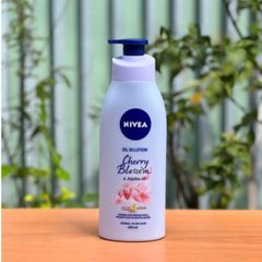 Lotion Nivea oil in lotion cherry blossom & jojoba oil  400ml hàng Úc 629307