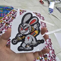 Tem sticker thỏ điên cầm phuộc OH 10cm trang trí xe máy, điện thoại, laptop