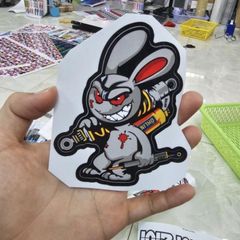 Tem sticker thỏ điên cầm phuộc OH 10cm trang trí xe máy, điện thoại, laptop