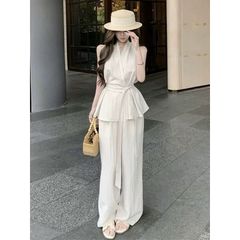 Set Áo gile + quần suông, áo vạt chéo, cổ V, cách điệu thời thượng nữ tính, màu đen và nâu sữa mẫu mới 2025