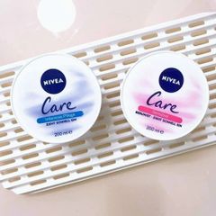 Kem dưỡng ẩm NIVEA CARE cung cấp vitamin E và vitamin A dưỡng ẩm cho da mặt và toàn thân 200ml