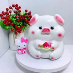 Ống heo tiết kiệm heo ăn dưa hấu