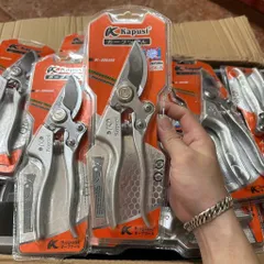 Kéo cắt cành thép SK5 với đá mài tự động và lò xo trợ lực Kapusi Japan, cực sắc bén cho việc tỉa cây.