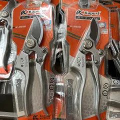 Kéo cắt cành thép SK5 với đá mài tự động và lò xo trợ lực Kapusi Japan, cực sắc bén cho việc tỉa cây.