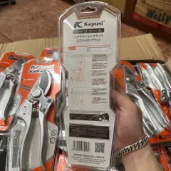 Kéo cắt cành thép SK5 với đá mài tự động và lò xo trợ lực Kapusi Japan, cực sắc bén cho việc tỉa cây.