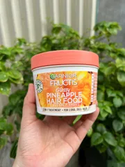 Ủ tóc Garnier giúp nuôi dưỡng tóc chắc khoẻ bóng mượt Garnier fructis glossy pineapple hair food