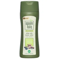 Dầu gội dược liệu Nguyên Xuân hương Bưởi (Chai 250ml) giúp dưỡng tóc mềm mượt, giảm gãy rụng và nuôi dưỡng da đầu.
