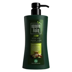 Dầu gội dược liệu Nguyên Xuân Dưỡng Tóc (Chai 250ml) giúp dưỡng tóc và da đầu.