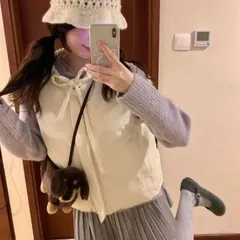 Áo phao gile hai mặt màu trắng và kẻ caro xanh viền bèo cổ nơ dễ thương