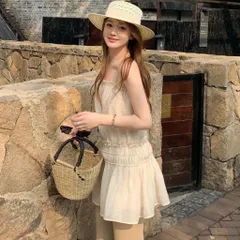 Váy hai dây màu kem trơn viền bèo dáng suông Hàn Quốc. Áo hai dây dáng dài mặc phối quần tiểu thư
