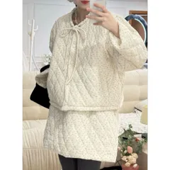 Set bộ áo phao cổ tròn và chân váy phao hoa nhí màu kem buộc dây nơ