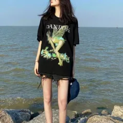 Áo phông đen hình cô gái mọc cánh trong.