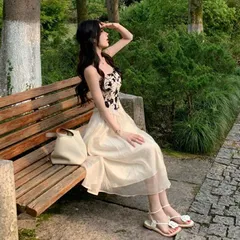Váy hai dây đen da báo kiểu corset voan trắng