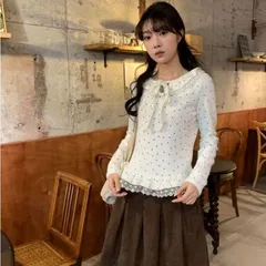 Áo mặc trong lông thỏ giữ nhiệt chấm bi lượn bèo thắt nơ. Áo mặc trong chấm bi đen trắng kem phối với áo khoác ngoài