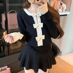 Áo len dài tay đính nơ đen trắng xinh xắn tiểu thư