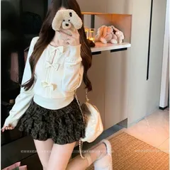 Áo len dài tay đính nơ đen trắng xinh xắn tiểu thư
