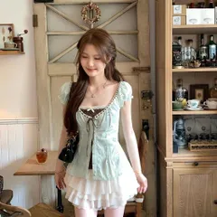 Áo thô bèo chấm bi kiểu thắt dây nơ phối hai lớp may liền đính cúc tiểu thư (SẴN CHUẨN QUẢNG CHÂU)