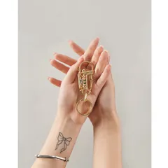 Móc khóa phong thuỷ bằng đồng thau phối mặt phật và liên hoa đá đỏ