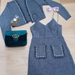 Mđầm body 2 dây có mút phối túi kết chuỗi 2 bên tua rua. Vãi bố.  Màu xám muối tiêu. Free size : từ 53kg trở xuống
