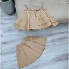 Set nâu áo 2 dây tầng nơ đính đá + Chân Váy có sẵn lót quần Chất liệu tapta xịn Hàng có sẵn giao ngay SM Giá 320k