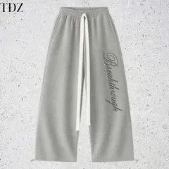 Quần Dài Nỉ 2 Da Unisex Nam Nữ Ống Rộng Hình Thêu Nổi THROUGH
