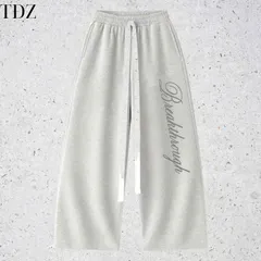 Quần Dài Nỉ 2 Da Unisex Nam Nữ Ống Rộng Hình Thêu Nổi THROUGH