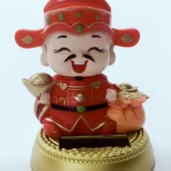 Tượng thần tài kèm túi vàng sử dụng năng lượng mặt trời cao 11cm cực đẹp