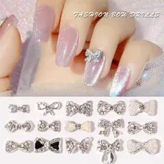 Set cham nơ bạc gắn đá đính móng siêu sáng đẹp