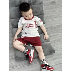 Quần áo bóng đá trẻ em, set bộ quần áo thể thao chất cotton phủ bóng họa tiết đội MU cho bé 10-30kg