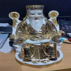 thần Tài ông địa địa ghế chéo vàng ( sành sứ ) có hoả tốc