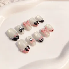 12. Nailbox nền mắt mèo vàng hoạ tiết nơ